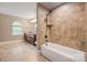 Bathroom with soaking tub and double vanity at 472 Barber Loop, Mooresville, NC 28117