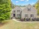 Two-story brick home with manicured lawn at 472 Barber Loop, Mooresville, NC 28117