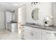 Elegant bathroom with double vanity, granite countertop and modern fixtures at 1162 S Kings Dr, Charlotte, NC 28207