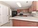 Kitchen features stainless steel appliances and an island at 1312 Crestfield Ct, Charlotte, NC 28269