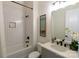 Clean bathroom with white subway tile, modern fixtures, and a soaking tub at 1855 Rock Hill Church Rd # 2, Matthews, NC 28104