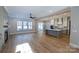 Open concept kitchen with an island, stainless steel appliances, and hardwood floors at 1865 Rock Hill Church Rd # 3, Matthews, NC 28104