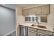 Kitchen with stainless steel appliances and white cabinetry at 306 S Cedar St # 10, Charlotte, NC 28202