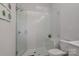 Clean bathroom with a walk-in shower and built-in seat at 4147 Merlane Dr, Charlotte, NC 28206