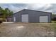 Detached garage with double roll-up doors and ample space at 4298 Maiden Hwy, Lincolnton, NC 28092
