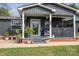 Front view of a charming ranch home with a covered porch and landscaping at 4298 Maiden Hwy, Lincolnton, NC 28092