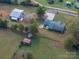 Aerial view showcasing home, detached shop, and spacious lot at 4298 Maiden Hwy, Lincolnton, NC 28092