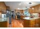 Spacious kitchen featuring granite countertops and oak cabinets at 4298 Maiden Hwy, Lincolnton, NC 28092