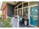 Charming front porch with rocking chairs and sunburst decor at 4298 Maiden Hwy, Lincolnton, NC 28092