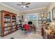 Home office with built-in bookcase and large window at 479 Club Dr, Stanley, NC 28164