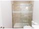 Bathroom with tiled shower and sliding glass door at 8724 Old Plank Rd, Charlotte, NC 28216