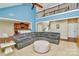 Open living room showcasing a large sectional sofa and a view into the kitchen at 16404 Grassy Creek Dr, Huntersville, NC 28078