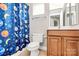 Bathroom with a shower/tub combo and wood vanity at 16404 Grassy Creek Dr, Huntersville, NC 28078