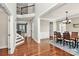 Two-story entry with hardwood floors, formal dining area, and staircase at 16404 Grassy Creek Dr, Huntersville, NC 28078