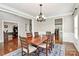 Open dining room with hardwood floors and kitchen views at 16404 Grassy Creek Dr, Huntersville, NC 28078