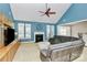Living room with a fireplace, built-ins, and a large sectional sofa at 16404 Grassy Creek Dr, Huntersville, NC 28078