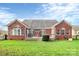Brick house exterior with a deck and backyard at 16404 Grassy Creek Dr, Huntersville, NC 28078