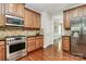 Kitchen with stainless steel appliances and granite countertops at 16404 Grassy Creek Dr, Huntersville, NC 28078