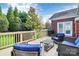 Spacious deck overlooking the backyard with seating at 16404 Grassy Creek Dr, Huntersville, NC 28078