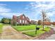 Two-story brick home with curb appeal at 16404 Grassy Creek Dr, Huntersville, NC 28078