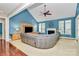 Expansive living room featuring vaulted ceilings, a fireplace, and ample natural light at 16404 Grassy Creek Dr, Huntersville, NC 28078