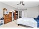 Bedroom with ceiling fan, dresser, and bookcase at 16404 Grassy Creek Dr, Huntersville, NC 28078