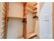 Wooden shelving and hanging space in a spacious closet at 2224 Taylor Rd, Shelby, NC 28152