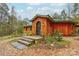 Unique wood home with arched entryway and stone steps at 2224 Taylor Rd, Shelby, NC 28152