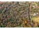 Aerial view showcasing property's secluded setting amidst trees at 2224 Taylor Rd, Shelby, NC 28152