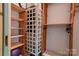 Shelved closet with hanging rods and additional storage at 2224 Taylor Rd, Shelby, NC 28152