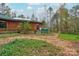Home exterior with hot tub and woodland setting at 2224 Taylor Rd, Shelby, NC 28152