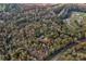Aerial view of home nestled in a wooded lot at 2224 Taylor Rd, Shelby, NC 28152