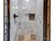 Shower with marble tile and mosaic accents at 2224 Taylor Rd, Shelby, NC 28152