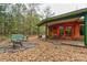 Round house exterior with wood siding and covered porch at 2224 Taylor Rd, Shelby, NC 28152