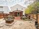 Large backyard with patio, pergola, and fire pit at 5414 Barley Ln, Charlotte, NC 28216