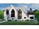 Elegant two-story home with stone exterior at 8015 Litaker Manor Ct, Charlotte, NC 28270