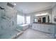 Elegant bathroom with marble shower and soaking tub at 119 Plantation Dr, Mooresville, NC 28117