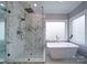 Spa-like bathroom with marble shower and soaking tub at 119 Plantation Dr, Mooresville, NC 28117
