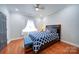 Bright bedroom with hardwood floors and a comfy bed at 119 Plantation Dr, Mooresville, NC 28117