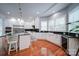Spacious kitchen with white cabinets, stainless steel appliances, and granite countertops at 119 Plantation Dr, Mooresville, NC 28117