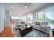 Spacious living room with hardwood floors and access to deck at 119 Plantation Dr, Mooresville, NC 28117