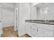Bathroom with granite countertops and double sinks at 183 Sugar Hill Rd, Troutman, NC 28166
