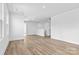 Spacious bonus room with light wood floors and access to a loft area at 183 Sugar Hill Rd, Troutman, NC 28166