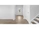 Spacious entryway with light wood floors and view to the front door at 183 Sugar Hill Rd, Troutman, NC 28166