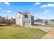 Two story house with attached garage and lawn at 183 Sugar Hill Rd, Troutman, NC 28166