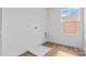 Laundry room with wire shelving and a window at 183 Sugar Hill Rd, Troutman, NC 28166