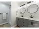 Modern bathroom with double vanity, updated fixtures, and shower at 325 Spring Oak Dr, Salisbury, NC 28147