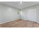 Simple bedroom with wood-look floors and a window at 325 Spring Oak Dr, Salisbury, NC 28147