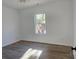 Bright bedroom featuring hardwood floors and large window at 536 Robinhood Rd # 27, Maiden, NC 28650