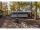 Charming single story home with a screened porch and firepit at 108,109 Sailors Ct # 108109, Mount Gilead, NC 27306